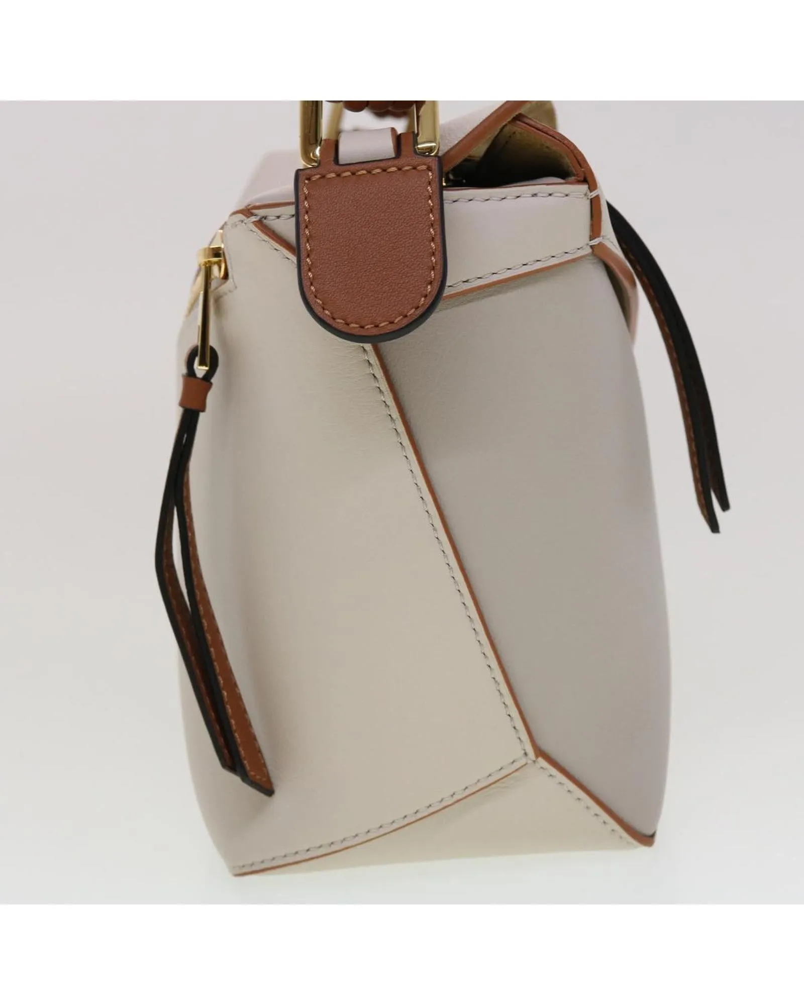 Taupe Leather Shoulder Bag with Puzzle Edge Design